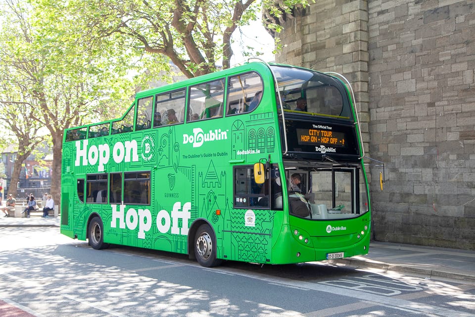 Dublin: Hop-on Hop-off Tour with Live German Commentary - From Collins Barracks to the Liffey: where the tour ends near the water
