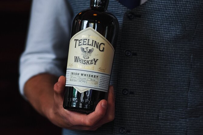 Sip and Stroll Whiskey History Walking Tour in Dublin - Stop 1: St. Patrick’s Tower and George Roe distilling roots